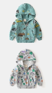 Detail view of boys zip-up hoodies with cartoon dinosaur and car prints in blue and grey