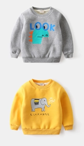 Close-up of children's thick fleece sweatshirts with dinosaur and elephant cartoon prints