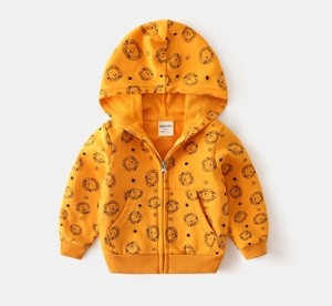 Detail of yellow toddler hoodie with black cartoon lion prints and zip closure