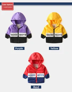 Detailed view of kids hooded windbreaker jackets in purple, yellow, and red colorblocks