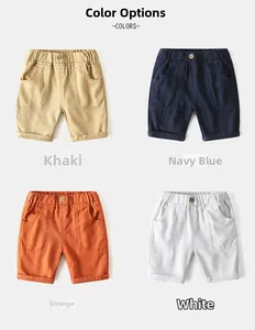 Detail of boys cotton casual shorts in khaki navy blue terracotta and white colors
