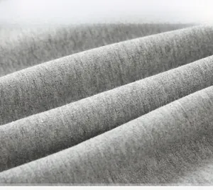 Close-up of soft grey knit fabric texture for kids sweatshirt showing high quality material