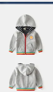 Detail of grey kids hoodie featuring sun patch, rainbow cuffs and COOL letter back print