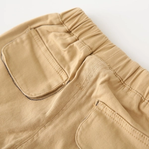 Boys casual khaki cotton trousers with elastic waistband and large pockets