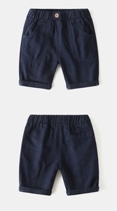 Detailed front and back views of navy boys cotton shorts with elastic waist and button