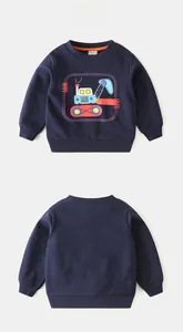 Detail of navy blue kids sweatshirt featuring a colorful cartoon excavator graphic print