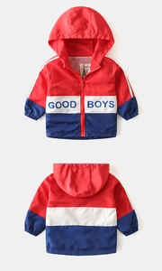 Detail of kids hooded jacket with mesh lining and color-block design in red white blue