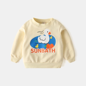 Detail of a cream kids sweatshirt featuring a cartoon duck sunbath print and ribbed cuffs