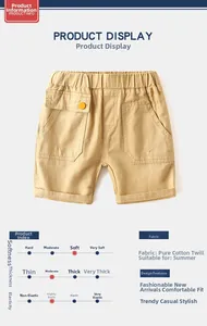 Detail of khaki boys cotton twill shorts showing elastic waist and side cargo pocket