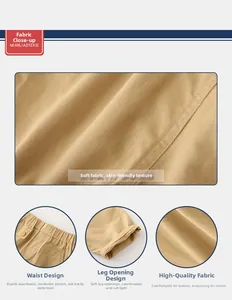 Close-up detail of khaki cotton twill shorts showing elastic waist and fabric texture
