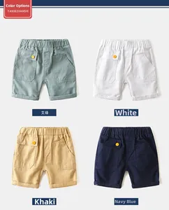 Detail of boys' cotton cargo shorts in four colors with elastic waist and large side pockets