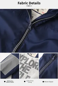 Détail de veste à capuche pour enfant avec manches réfléchissantes et doublure imprimée