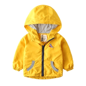 Yellow hooded windbreaker for kids featuring blue dinosaur embroidery and striped lining