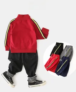 Detailed flat lay of boys red zip-up hoodie showing sleeve cuffs and color variations