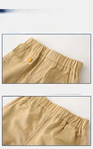 Detail of khaki cotton boys shorts featuring elastic waistband and contrast stitching
