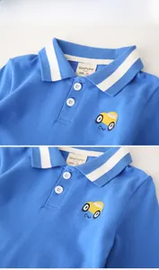 Détail d'un polo à manches longues bleu ciel pour garçon avec broderie voiture et col rayé
