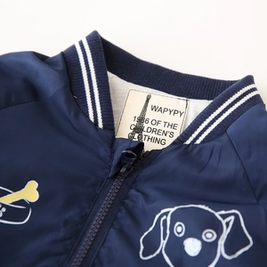 Kids navy windbreaker jacket with striped ribbed collar and cartoon dog print detail