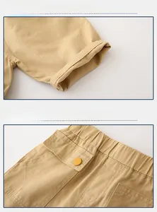 Detail view of khaki cotton shorts featuring elastic waist and buttoned flap pockets