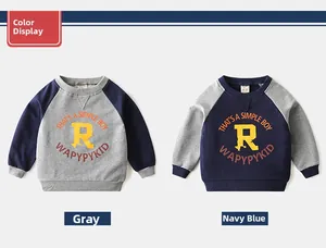 Detail of children's raglan sleeve sweatshirts with ribbed cuffs and letter print