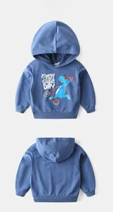 Detail view of blue cotton hoodie featuring cartoon dinosaur and Every Day text print