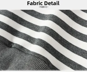Detail of grey and white striped knit fabric with ribbed hem for toddler sweatshirts