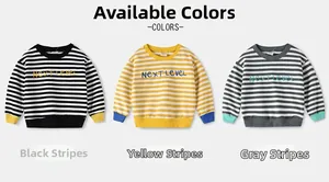 Detailed flat lay of striped kids sweatshirts in black, yellow and gray with embroidery