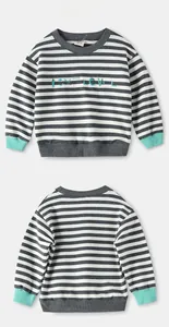 Flat lay of striped kids sweatshirt showing front and back with NEXT LEVEL embroidery