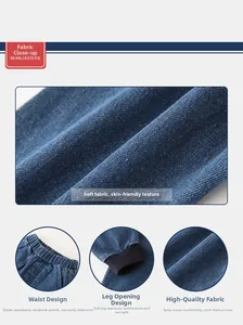Detail view of elastic waistband and ribbed cuffs on kids blue denim jogger pants