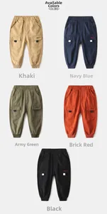 Collection of kids' cotton cargo pants featuring elastic waist and large flap pockets