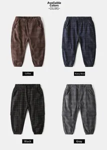 Detail view of children plaid cargo pants showing four colors with elastic waist and pockets