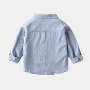 Classic light blue long-sleeve kids shirt with grandad collar and natural cotton texture