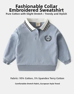 Detail of blue boys' sweatshirt with polo collar and laurel leaf embroidery