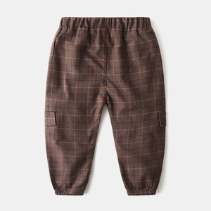 Close-up of kids plaid casual pants featuring elastic waist and utility side pocket