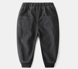 Detail of kids gray denim jogger showing elastic waist and back pockets on white background