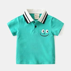 Detailed view of kids mint green polo shirt with striped collar and smiley face print