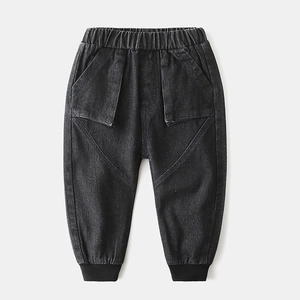 Kids black cargo denim joggers with elastic waist and large flap pockets for casual wear