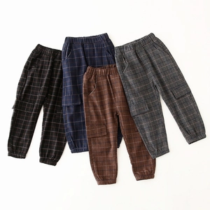 Kids plaid cargo pants in brown, navy, black and grey with elastic waist and cuffs