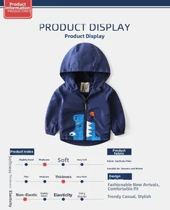 Detailed view of kids navy blue jacket featuring dinosaur embroidery and fabric labels