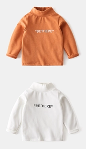 Detail view of children's fleece T-shirts with high collar and BETHERE print