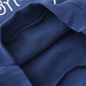 Thick navy blue boys hoodie featuring a soft fleece lining and ribbed cuff details