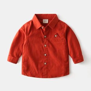 Classic bright orange long-sleeve cotton shirt for boys with dark buttons and chest pocket