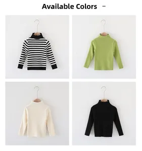 Close-up of four colors of children's ribbed turtleneck knit sweaters on hangers