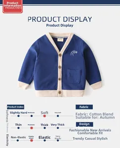 Detail of navy knit cardigan for boys with dinosaur embroidery and wooden buttons