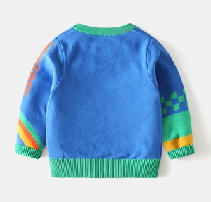 Detailed back view of kids knit sweater with UNIVERSE sleeve text and green ribbing