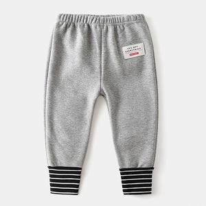 Kids warm gray fleece joggers with striped ribbed cuffs and stylish letter patch