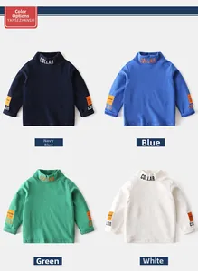 Detail of boys turtleneck long sleeve tees in navy, blue, green and white colors