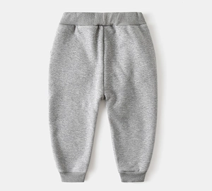 Detailed view of kids' gray fleece joggers featuring ribbed elastic waistband and cuffs