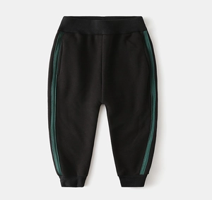 Detail of fleece-lined kids joggers showing thick fabric and side stripes