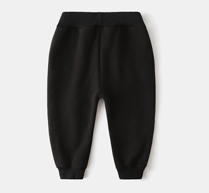 Detail view of boys fleece-lined thick jogger pants with elastic ribbed waistband and cuffs