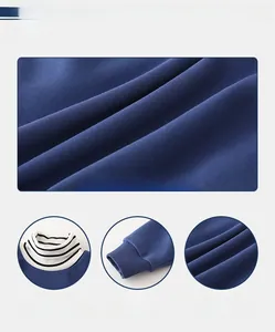 Detail of striped turtleneck, ribbed cuffs and thick knit fabric on boys' sweater